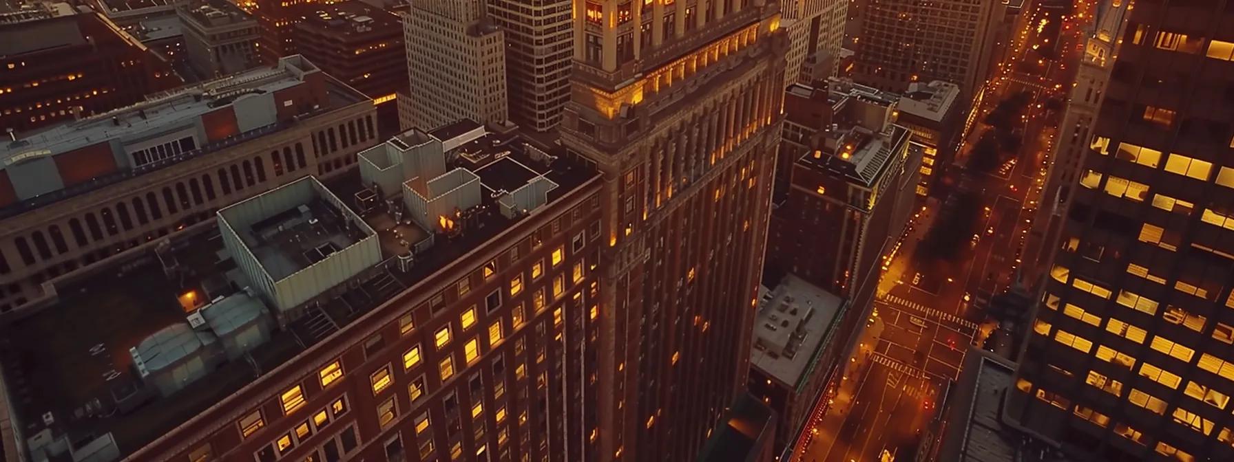 a breathtaking aerial view captures a vibrant philadelphia skyline at sunset, with elegantly adorned couples celebrating their unique wedding styles against a backdrop of historic architecture and modern artistry, embodying the essence of innovative videography.